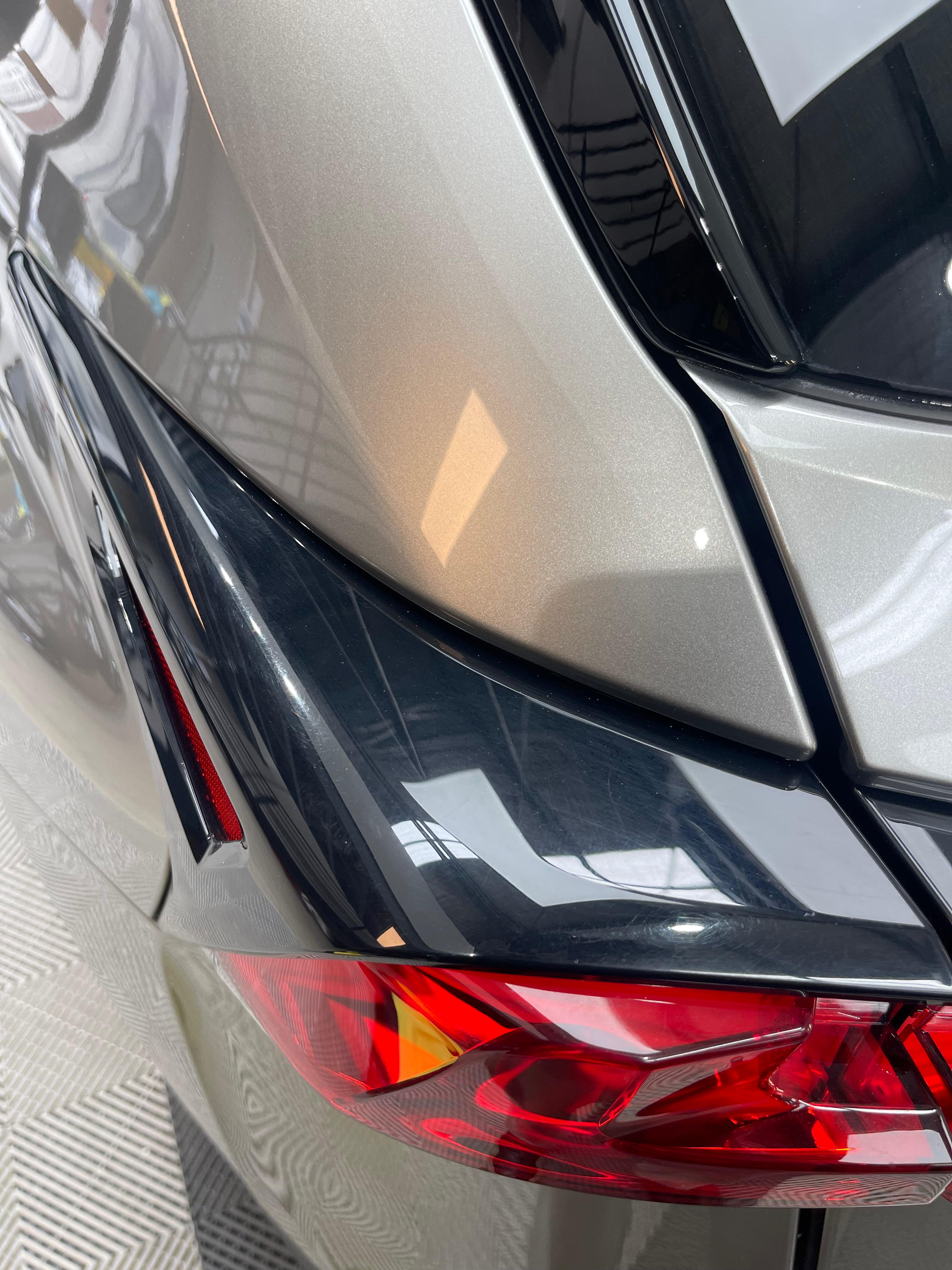 Before detailing - rear taillight area with dirt and dullness
